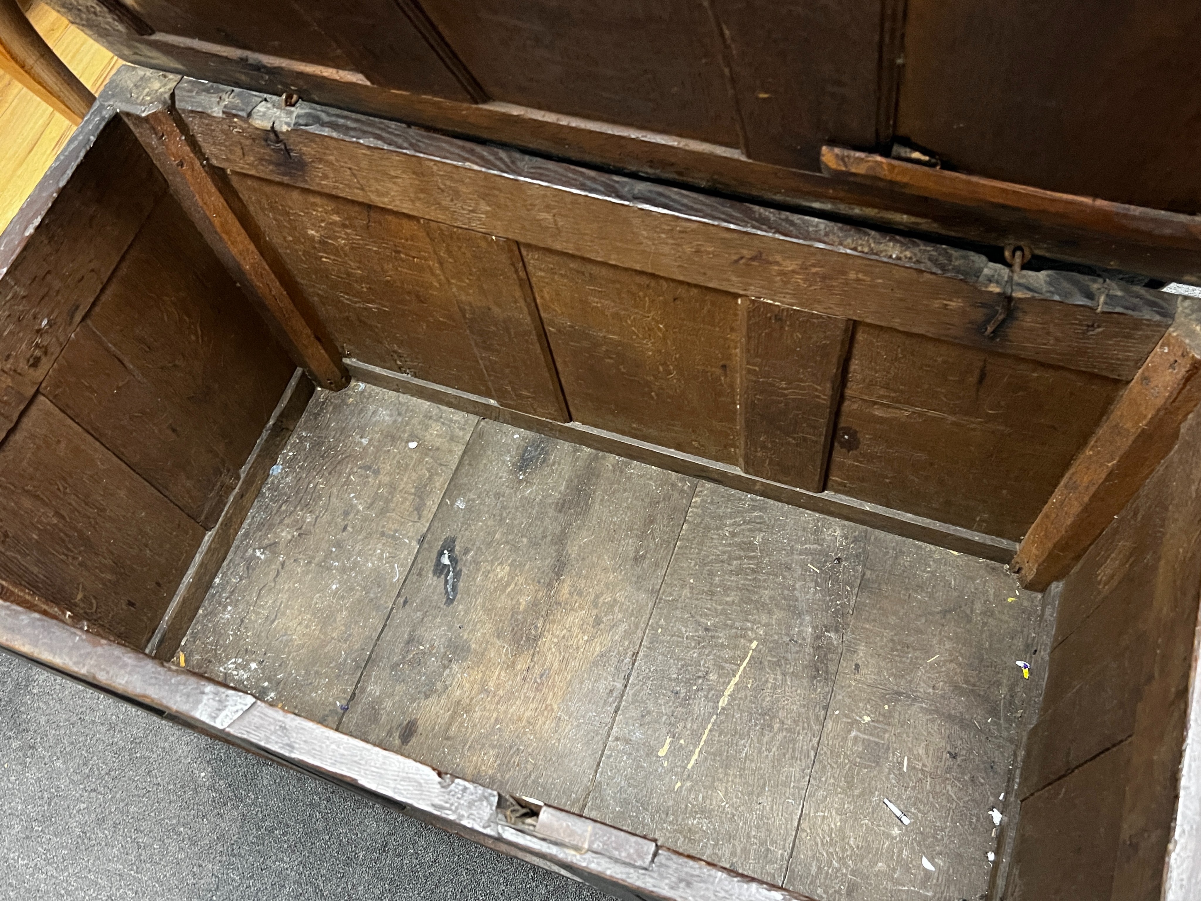 An 18th century panelled oak coffer, length 103cm, depth 53cm, height 64cm